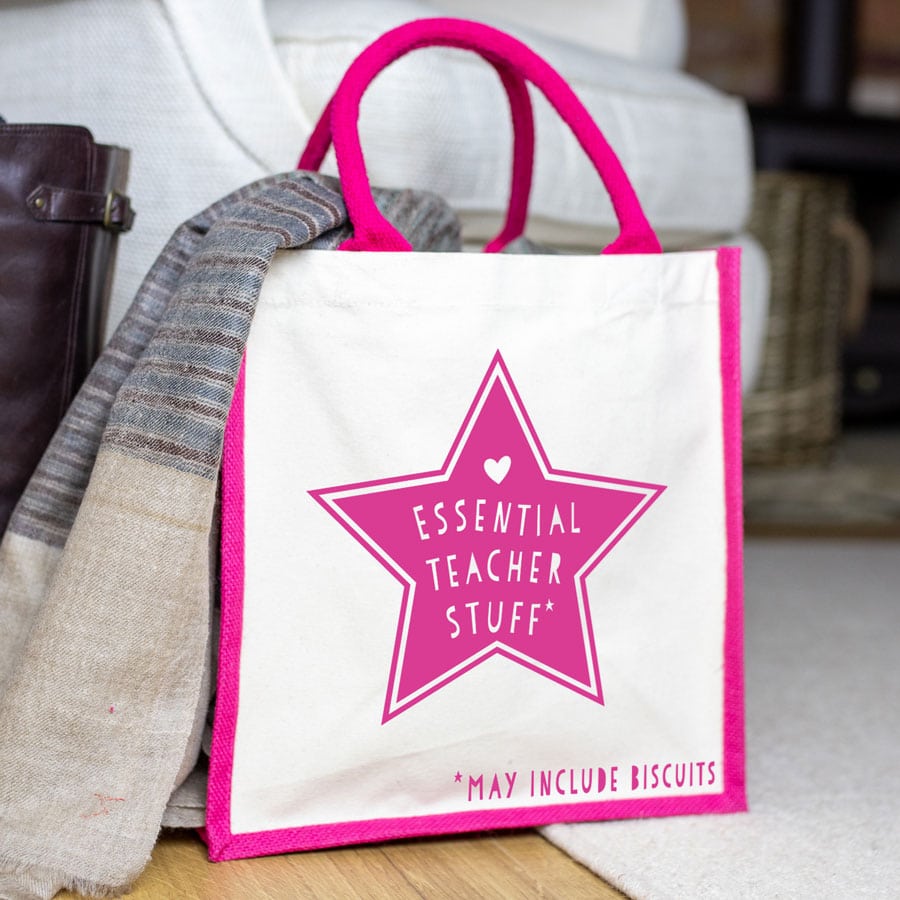 Essnetial Teacher Stuff canvas bag (Pink) features a pink canvas bag perfect as a gift for a teacher at the end of school term or just to say thank you