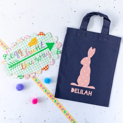 This personalised pink bunny Easter bag in blue grey is the perfect way to make your child's Easter egg hunt super special this year