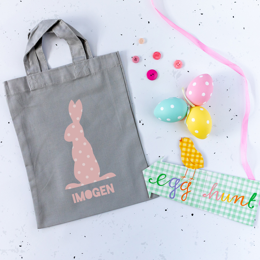 This personalised pink bunny Easter bag in light grey is the perfect way to make your child's Easter egg hunt super special this year
