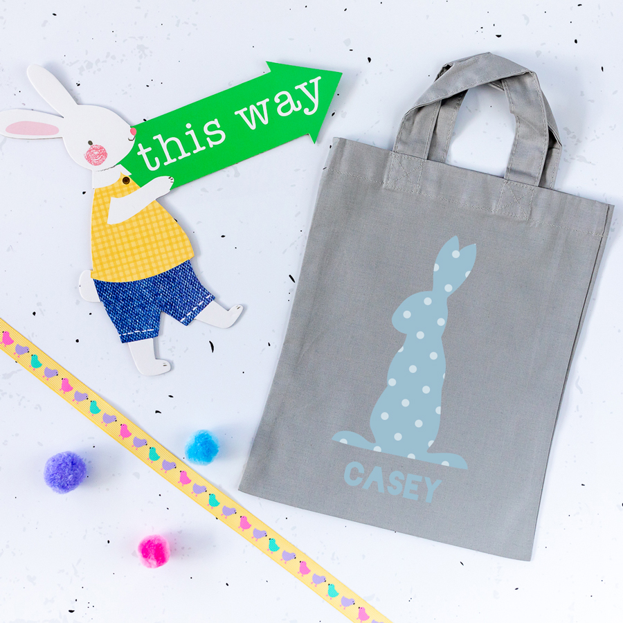 This personalised blue bunny Easter bag in light grey is the perfect way to make your child's Easter egg hunt super special this year