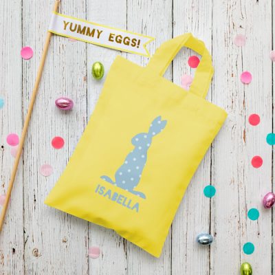 This personalised blue bunny Easter bag in yellow is the perfect way to make your child's Easter egg hunt super special this year