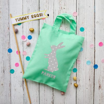 This personalised grey bunny Easter bag in mint green is the perfect way to make your child's Easter egg hunt super special this year