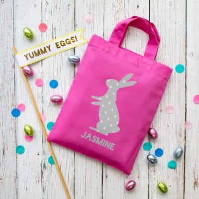 This personalised grey bunny Easter bag in pink is the perfect way to make your child's Easter egg hunt super special this year