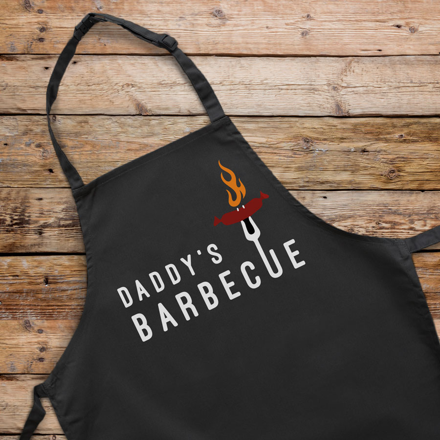 Personalised sizzling sausage apron (Adult) in black is a perfect gift for a brother, father or Grandad on their birthday or as a gift for father's day