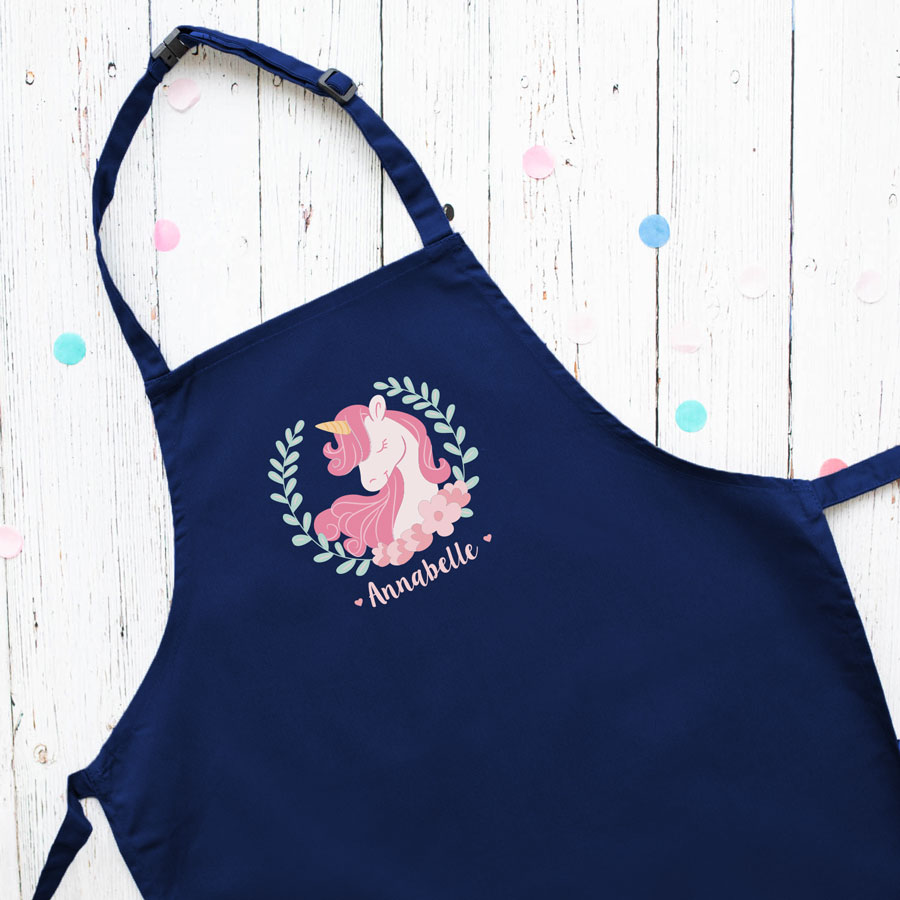 Personalised unicorn wreath apron (Navy) perfect gift for a child who loves to help with baking and cooking