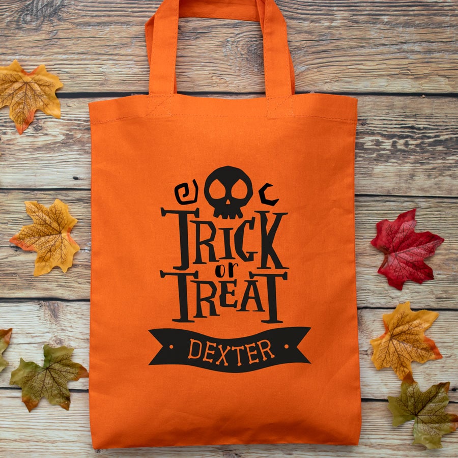 Personalised Halloween trick or treat bag (Orange) perfect for Halloween trick or treat featuring trick or treat quote and personalised banner