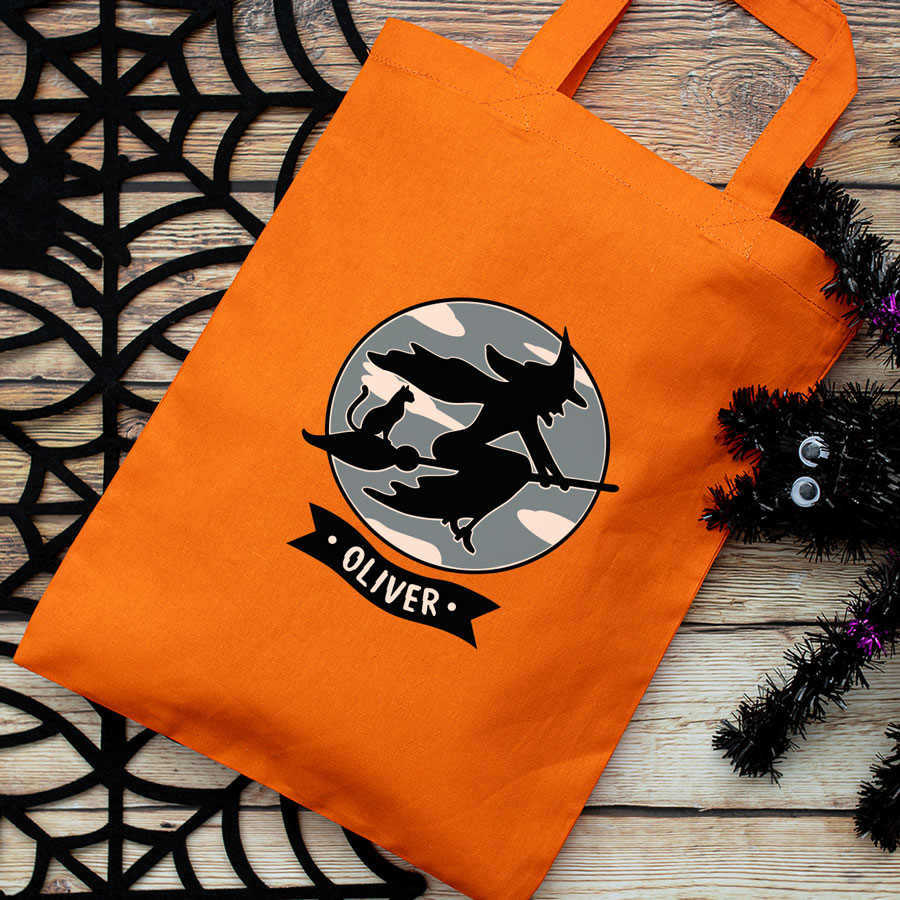 Personalised witch and cat trick or treat bag (Orange) perfect for Halloween trick or treat featuring a witch and cat on a broomstick and personalised banner