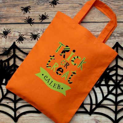 Personalised trick or treat bag (Orange) perfect for Halloween trick or treat featuring trick or treat quote and personalised banner