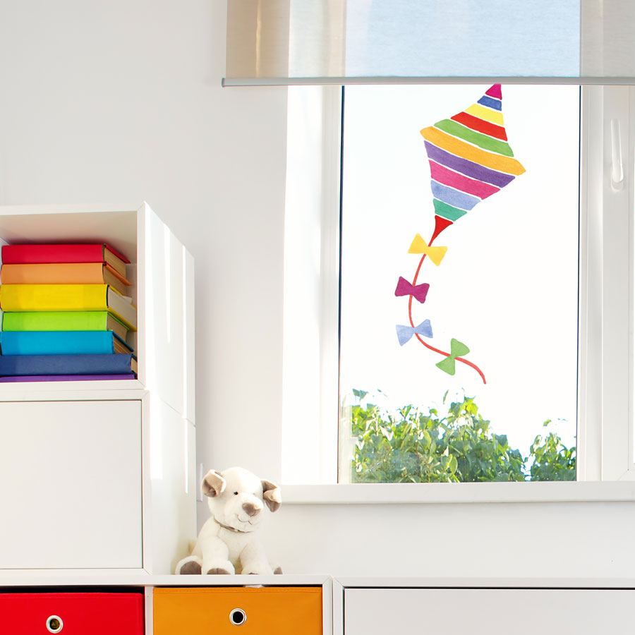 Rainbow kite window sticker perfect for a child's bedroom window to brighten up their room with vibrant rainbow colours