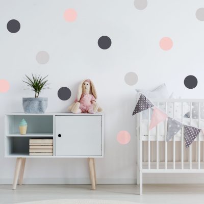Grey and pink spot wall stickers perfect for creating a contemporary theme for a baby's nursery