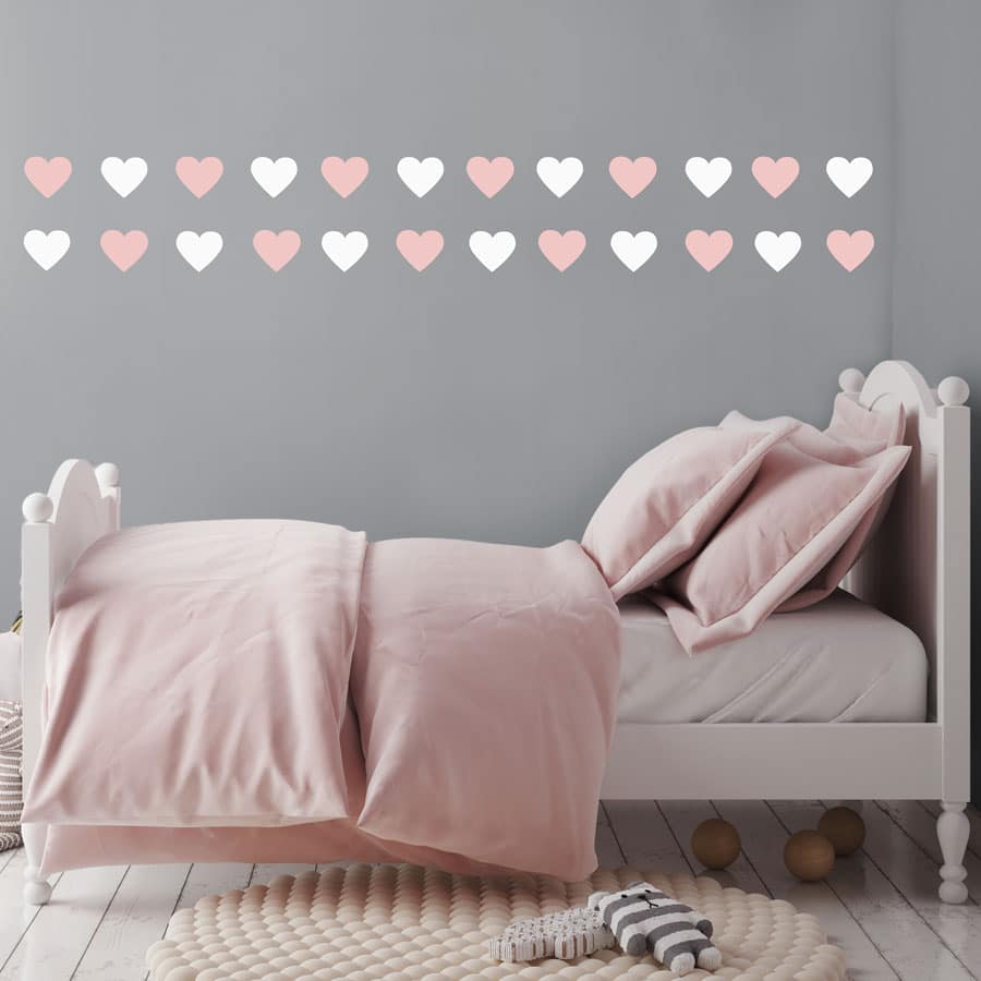 White and pink heart wall stickers from our peel and stick collection quick and easy to apply to decorate your childs room.