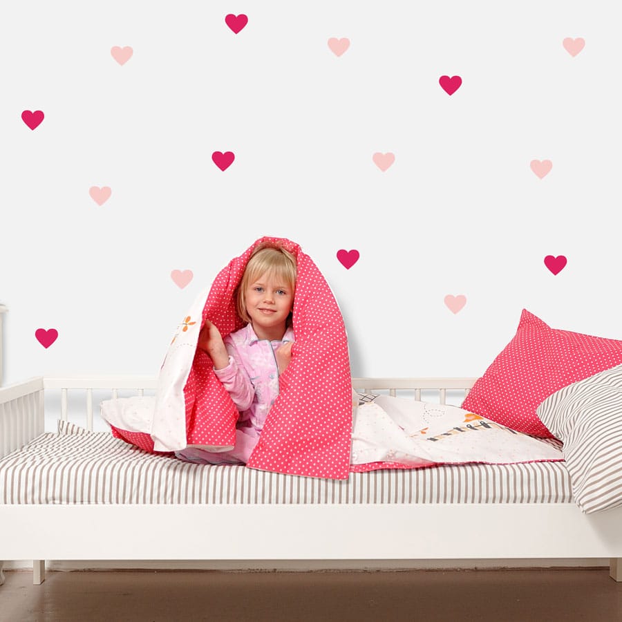 Light pink and hot pink heart wall stickers from our peel and stick collection quick and easy to apply to decorate your childs room.