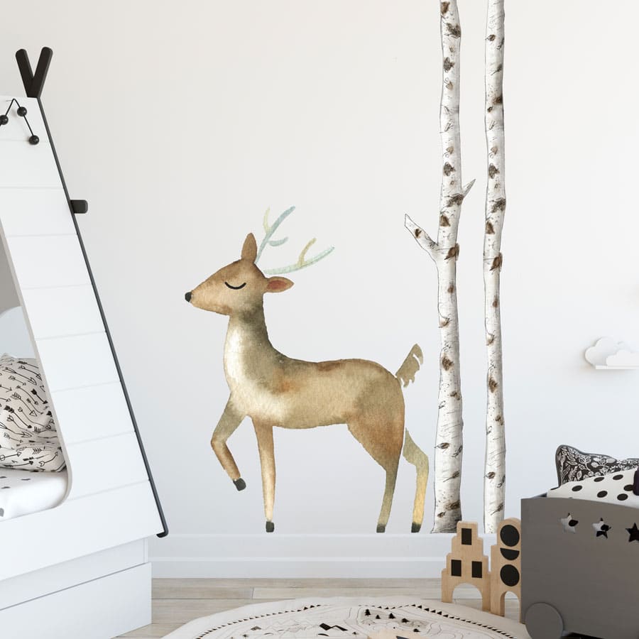 Watercolour tree and animal wall sticker featuring a deer in a Scandi style perfect for creating a woodland themed bedroom