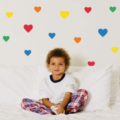 Bright rainbow heart wall stickers from our peel and stick collection quick and easy to apply to decorate your childs room