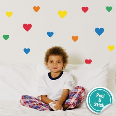 Bright rainbow heart wall stickers from our peel and stick collection quick and easy to apply to decorate your childs room