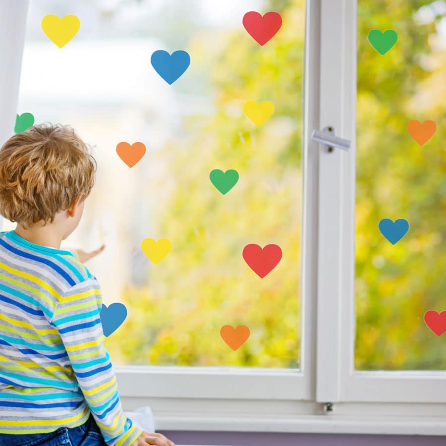 Bright rainbow heart window stickers quick and easy to apply to decorate your childs room.