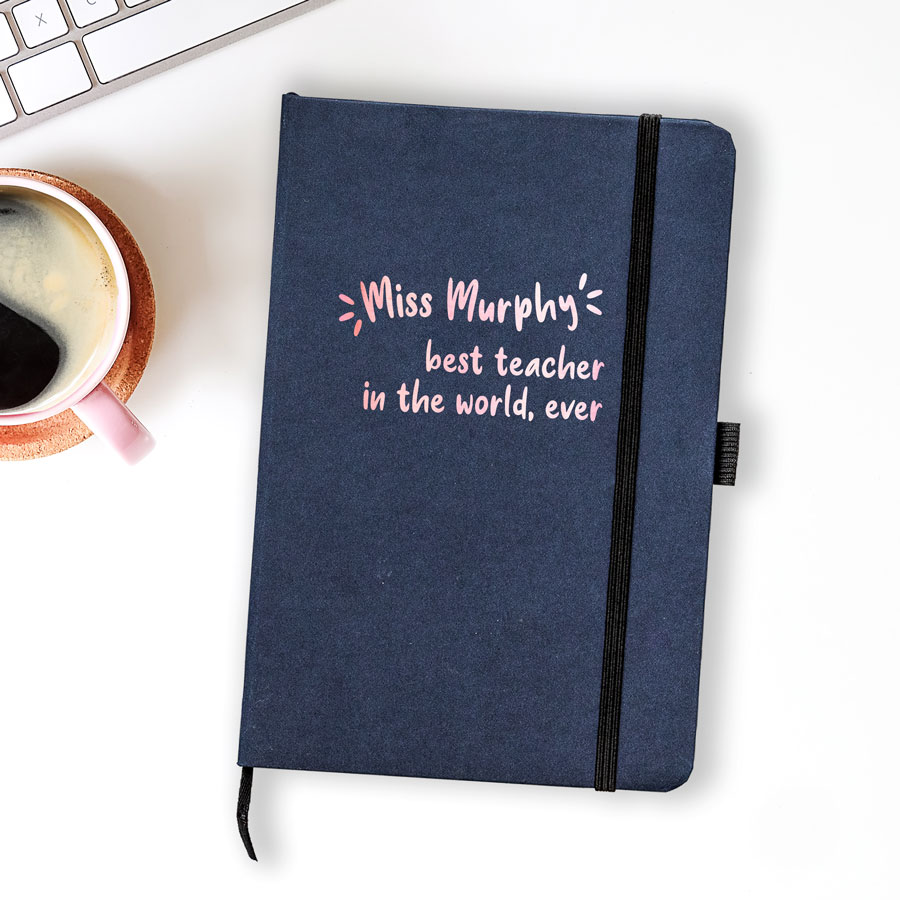 Personalised best teacher in the world notebook in blue features the text 'best teacher in the world, ever' plus personalised name underneath and is a perfect gift for a teacher or teaching assistant to say thank you
