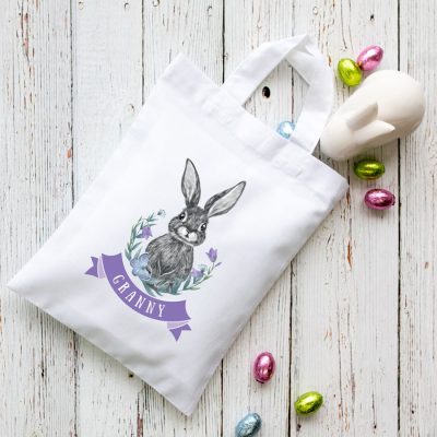 Personalised bunny and flowers Easter bag (White) is the perfect way to make your child's Easter egg hunt super special this year
