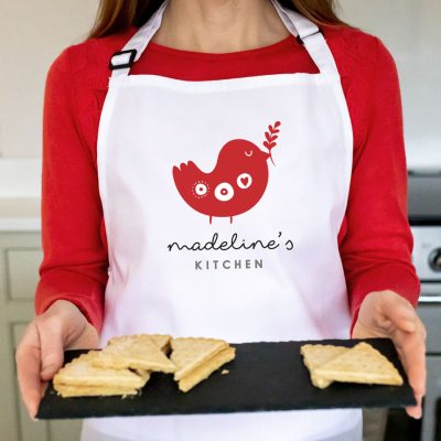 personalised robin apron in white perfect for Christmas baking