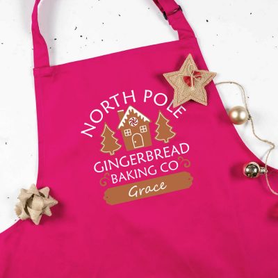 Gingerbread Baking Co apron in pink personalised with a name of your choice a perfect gift for Christmas baking