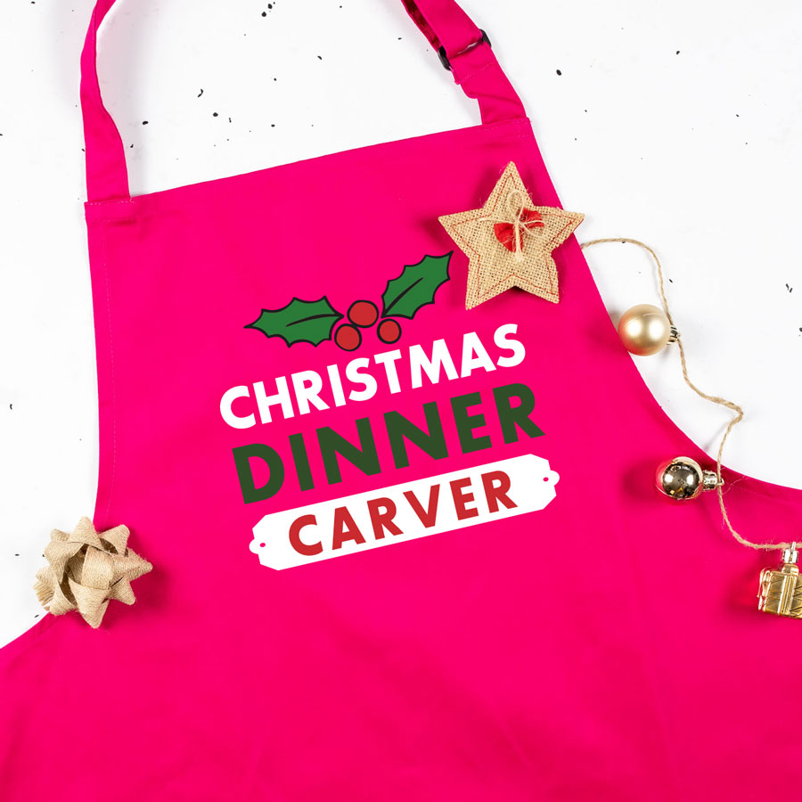 Personalised Christmas dinner apron in pink perfect for family Christmas dinner preparation