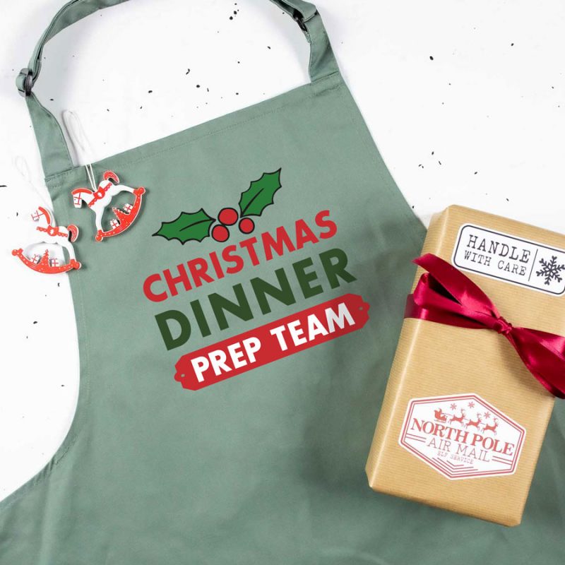 Personalised Christmas dinner apron in sage perfect for family Christmas dinner preparation