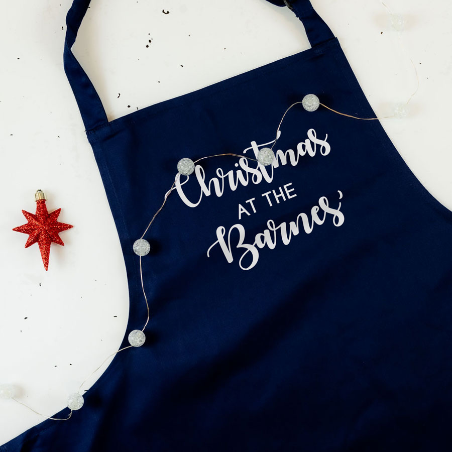 Personalised Christmas family apron in navy with personalised text perfect baking and cooking at Christmas
