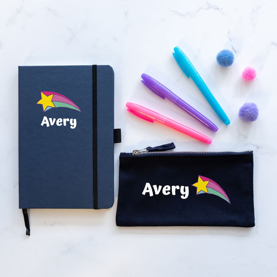 Mini Retro doodles back to school bundle featuring a blue notebook and navy pencil case. With the name Avery in white with a pink yellow and blue shooting star.