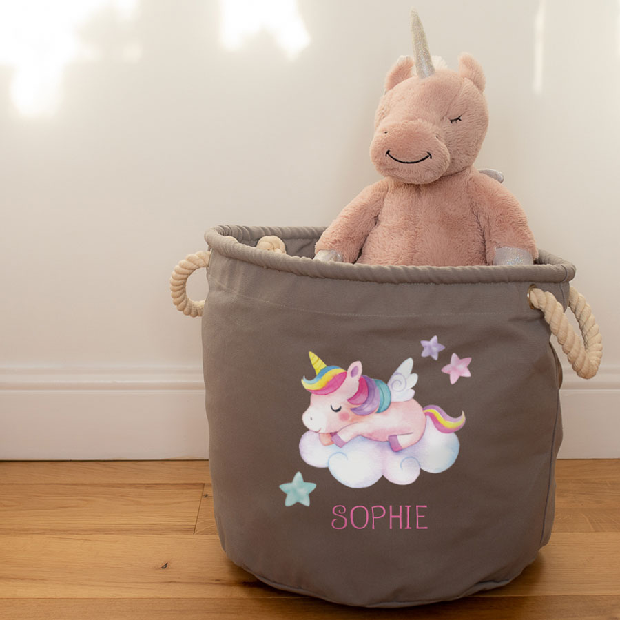 Personalised unicorn and cloud storage trug (Grey - Medium) with a pink unicorn cuddly toy