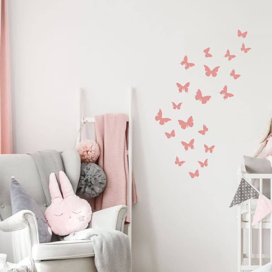 Butterfly Wall Stickers in pink on a wall