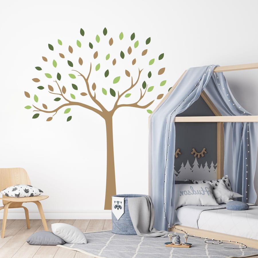Woodland Tree Wall Sticker on a wall behind bed