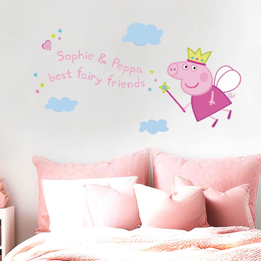 Personalised Fairy Peppa Pig Wall Sticker above a child's pink bed
