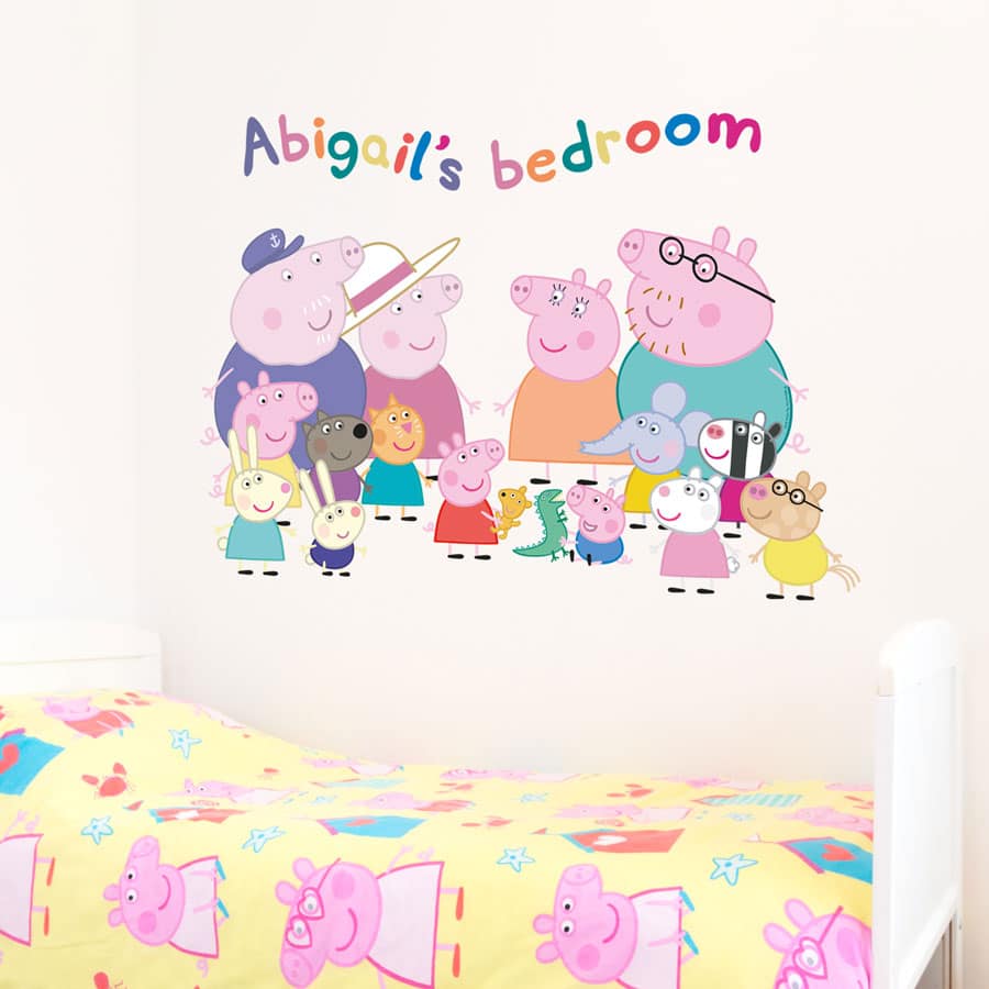Personalised Peppa Pig and Family Wall Sticker (Large size) on a bedroom wall above a Peppa Pig themed bed