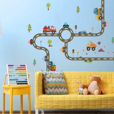 road network wall sticker pack shown on a light blue wall behind a yellow sofa and side table