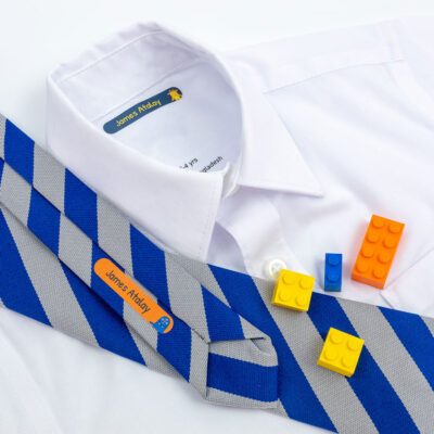 Monster name labels on school tie and uniform