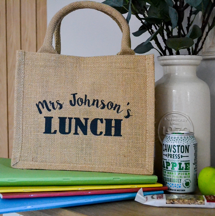 Stickerscape Lunch Bag, grey text on shimmer jute