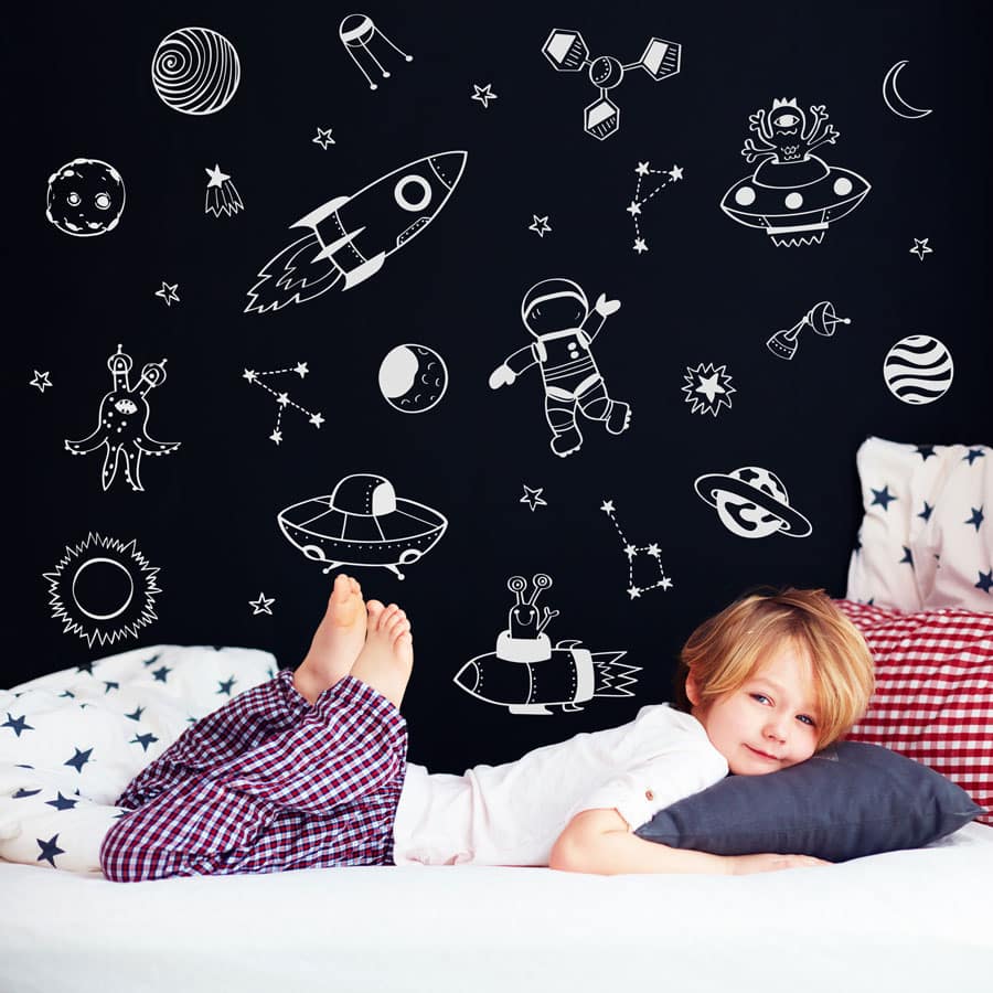 Space Doodles Wall Stickers in white on a dark wall