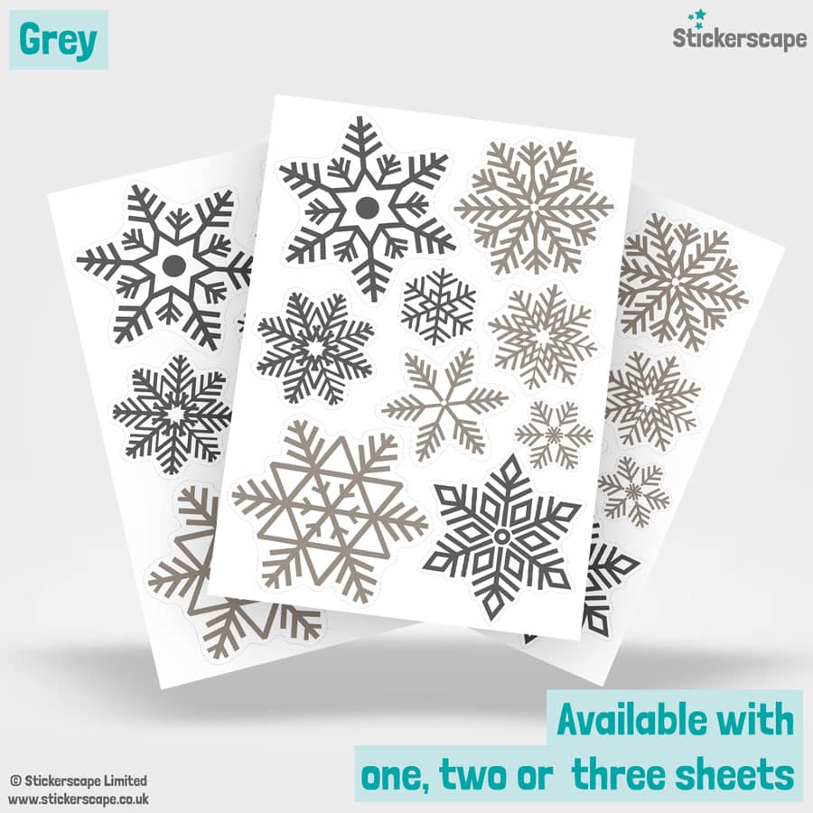 blue and grey snowflake window stickers sohwing sheet layout on a white background