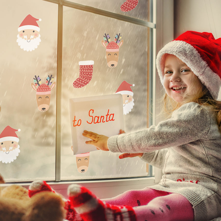 Santa, Rudolph and stocking windows stickers perfect for creating a Christmas themed room during the festive season