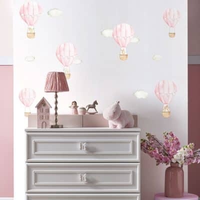 pink hot air balloon wall stickers decorating a bedroom wall above a dresser