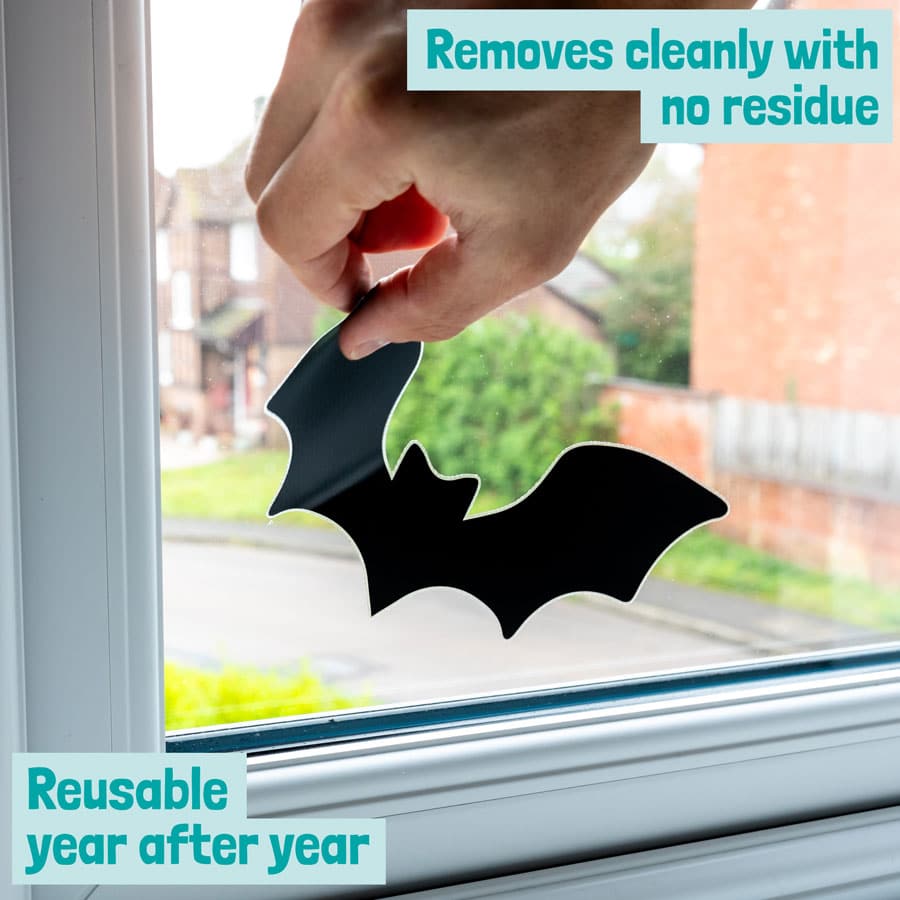 bat window stickers being removed showing clean removability and reusability