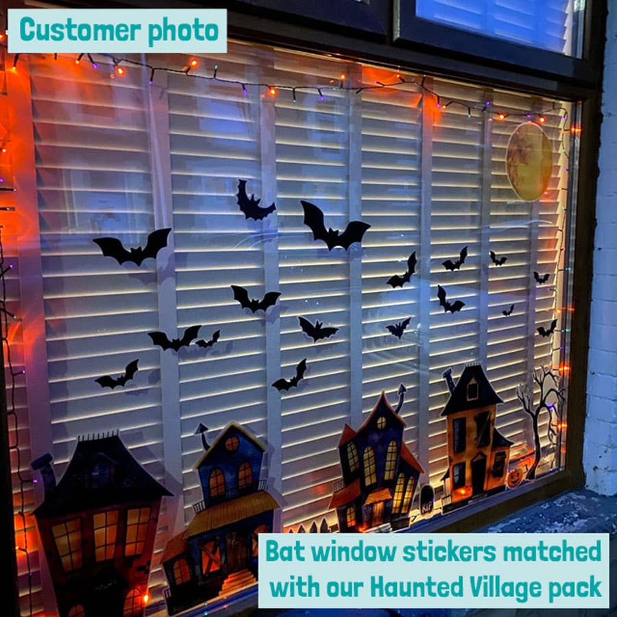 Bat window stickers on a window with a real life customer window