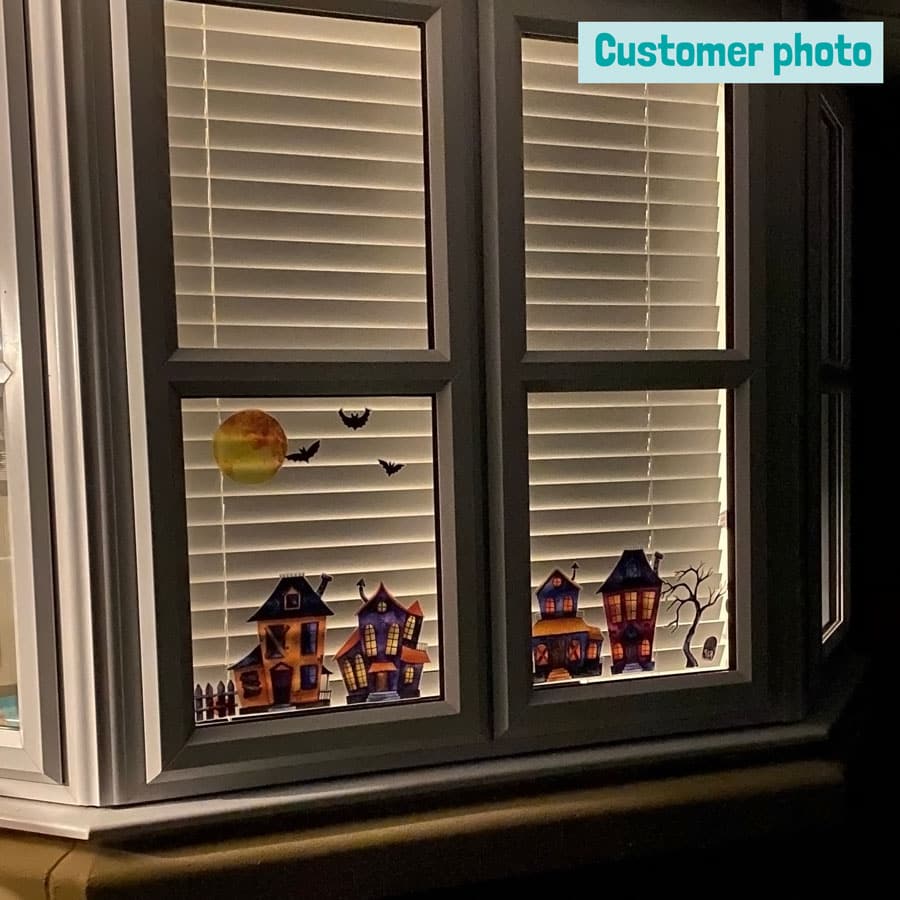 Haunted Village Window Stickers on a window from outside a customer photo
