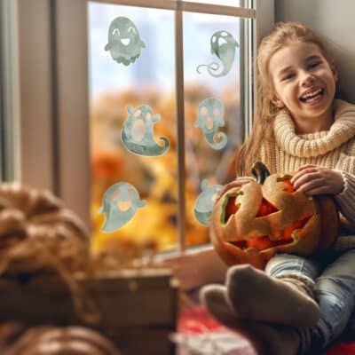 Ghost Window Stickers on window behind child