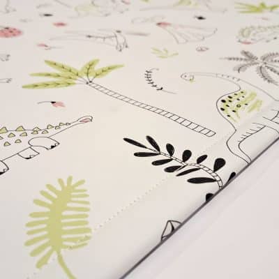 close-up of dinosaur outlines roller blind fabric