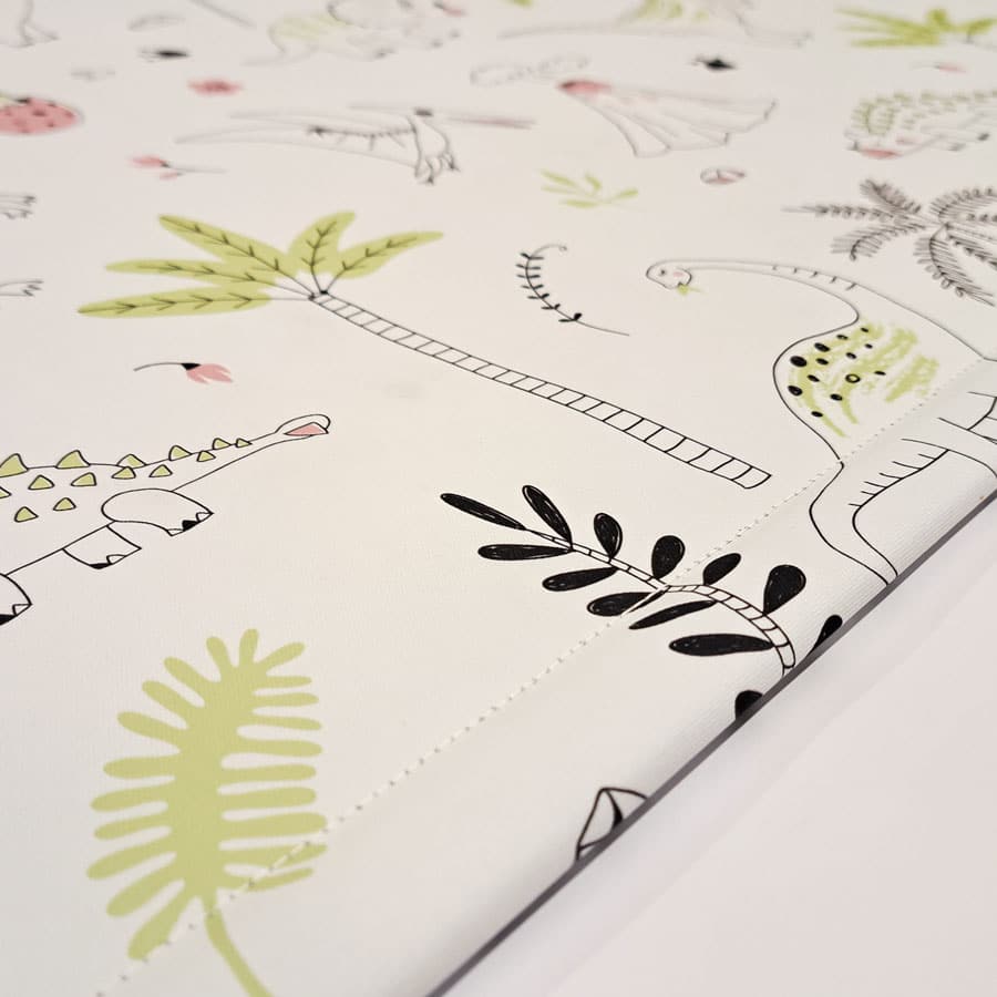 close-up of dinosaur outlines roller blind fabric