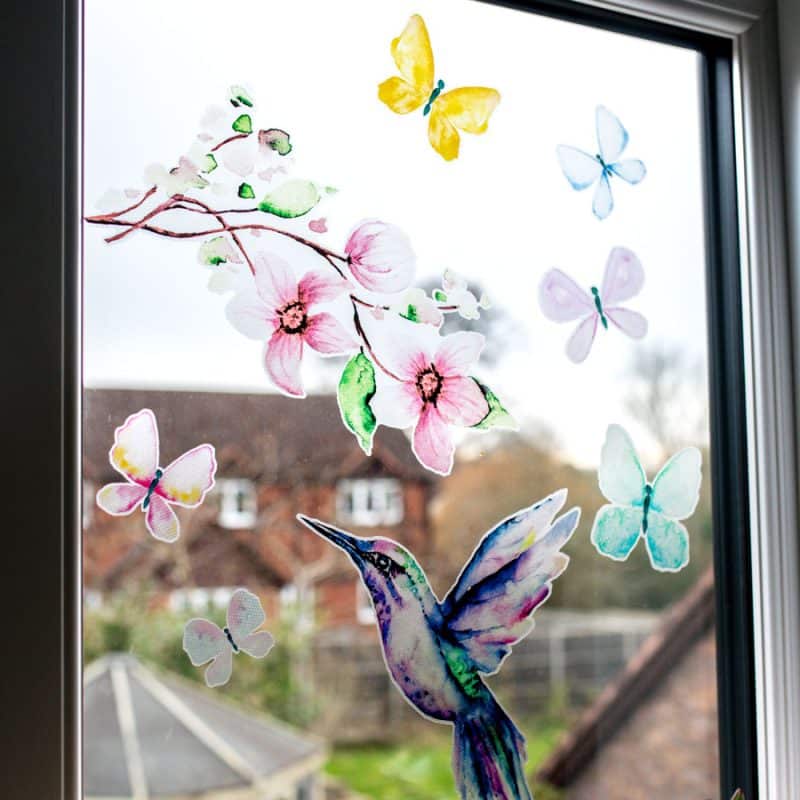 hummingbird and butterflies window stickers on a window