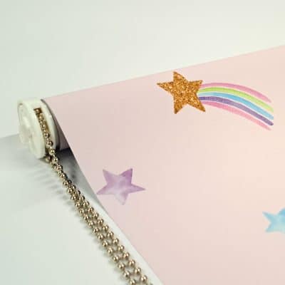 close-up of pink shooting star roller blind with blind mechanism and a chrome chain