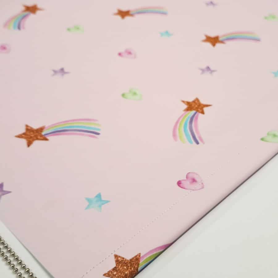 pink shooting star roller blind close-up of blackout blind fabric