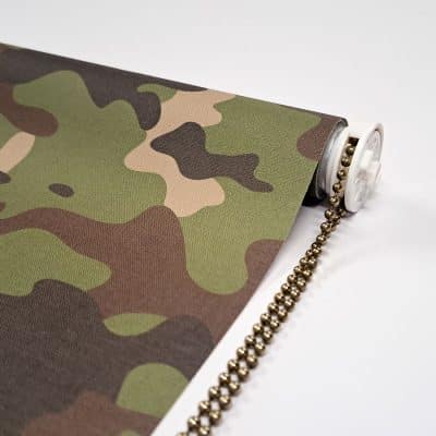 close-up of camouflage roller blind mechanism with chrome chain